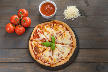 Fresh Pizza on Wood Table