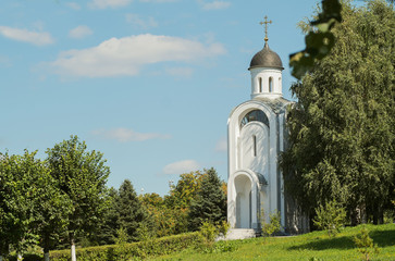 Fototapeta na wymiar White Church in the Park