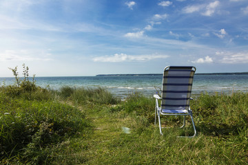 The solitude of the chair at the beach