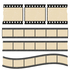 Vector retro worn torn film strips - waveform and straight strip. Insulated windows - you can create variable long straight filmstrip. Eps 10 vector file.