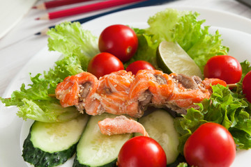 Healthy business lunch in office, vegetables and salmon closeup