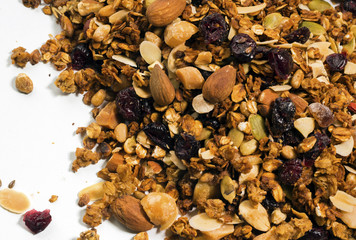 Granola heap, isolated on white background.