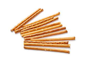 Salty cracker pretzel sticks isolated on white background