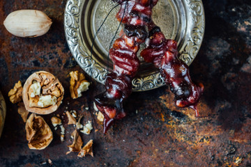 Sweet churchkhela with ingredients.