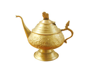 Antique brass teapot with a pattern isolated on white background