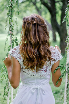 Beautiful wedding hairstyle with the bride turning back.