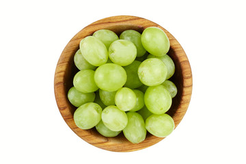 green berries of grapes in a plate