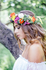 Wedding hair style - bride with flower wreath, bridal event.