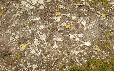 many keys on the ground as a background or texture.