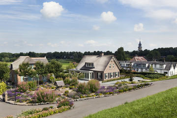 Fototapeta na wymiar Dike and houses in the Netherlands