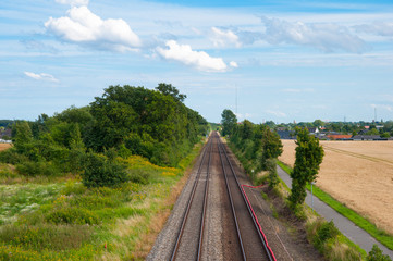 Fototapeta na wymiar Railway in the danish countryside near city of Vordingborg