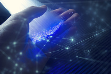 hand pick the network fiber optic with abstract background
