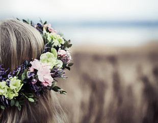 Rear view of woman wearing flower wreath