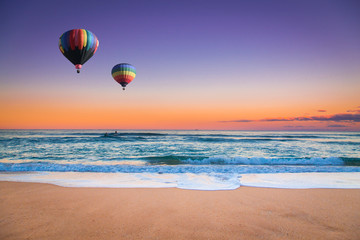 Hot air balloon over beach in summer, New south wales, Australia