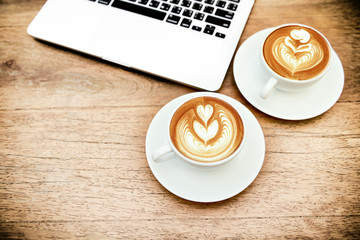 Vintage toned, grain and texture coffee latte art.