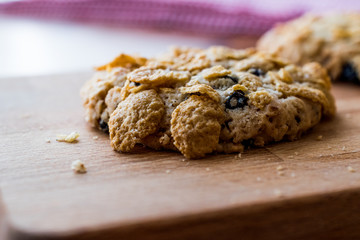 Cornflake Cookies on wooden surface.