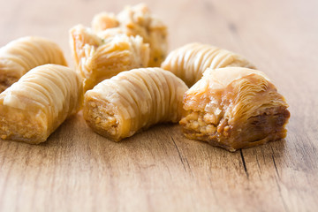 Turkish dessert baklava on wooden table
