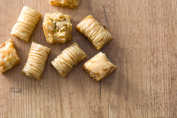 Turkish dessert baklava on wooden table
