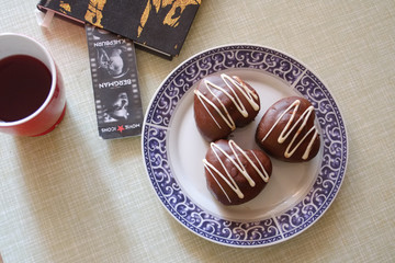 Dessert on a plate and a book