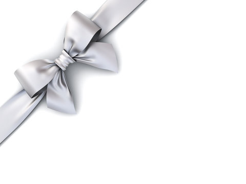 Silver gift ribbon bow isolated on white background with shadow . 3D rendering.