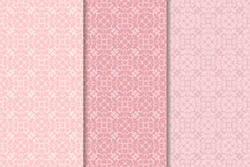 Set of floral ornaments. Pale pink vertical seamless patterns