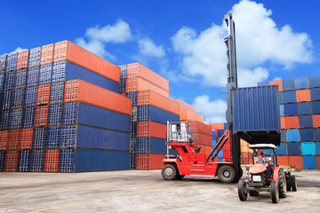 forklift handling the container box at dockyard