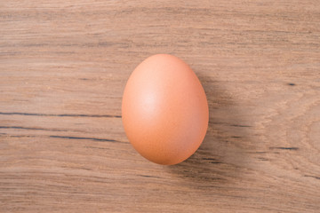 Close up Single Egg on wooden background, isolated, fresh egg