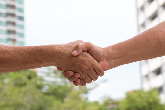 Close up of Handshaking for agreement acception