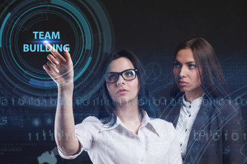 The concept of business, technology, the Internet and the network. A young entrepreneur working on a virtual screen of the future and sees the inscription: Team building