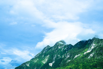 Fototapeta premium The fog over green mountain at sunset in north of Thailand