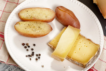 Plate of  french cheese with potatoes