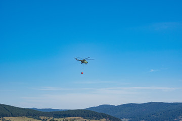Flying helicopter in the air