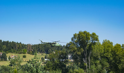 Flying helicopter in the air