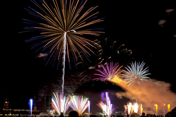 Fototapeta na wymiar Festive firework for celebration of Riga city day