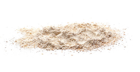 Pile of integral spelt wheat flour in wooden spoon isolated on white background