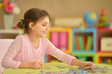girl collecting puzzles