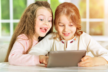 little girls using tablet