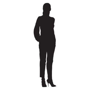 recommend clip art: Woman standing with hands in pockets dressed in trousers and shirt. Isolated vector silhouette