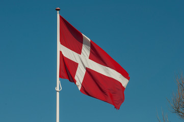 Danish flag on blue sky