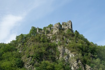 Fototapeta na wymiar Castle on the rock in the woods. Slovakia