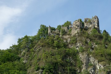 Fototapeta na wymiar Castle on the rock in the woods. Slovakia