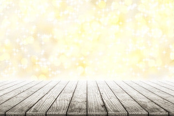 Empty wooden table with shining stars and golden bokeh background blurred. Concept celebration, happy, romantic, gift, valentines