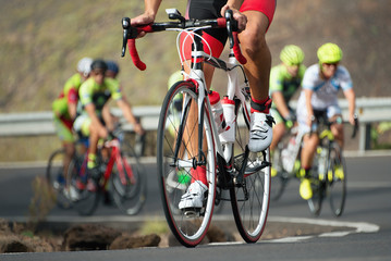 Cycling competition,cyclist athletes riding a race at high speed