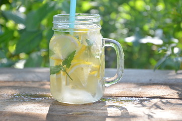 Lemon mojito cocktail with mint lemonade, cold refreshing drink or beverage, ice