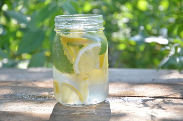 Lemon mojito cocktail with mint lemonade, cold refreshing drink or beverage, ice