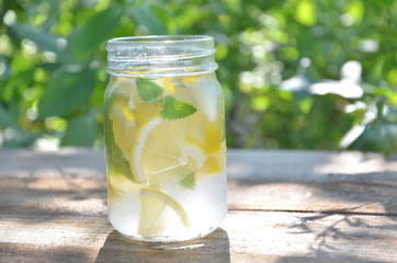 Lemon mojito cocktail with mint lemonade, cold refreshing drink or beverage, ice