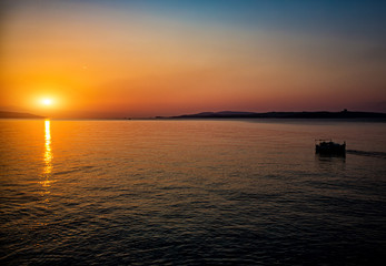 Panorama of sunset or sunrise on the calm sea