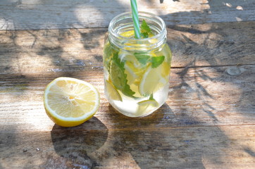 Lemon mojito cocktail with mint lemonade, cold refreshing drink or beverage, ice