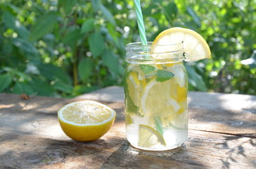 Lemon mojito cocktail with mint lemonade, cold refreshing drink or beverage, ice