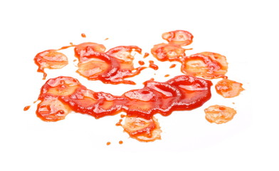 Red ketchup splashes isolated on white background, tomato pure texture